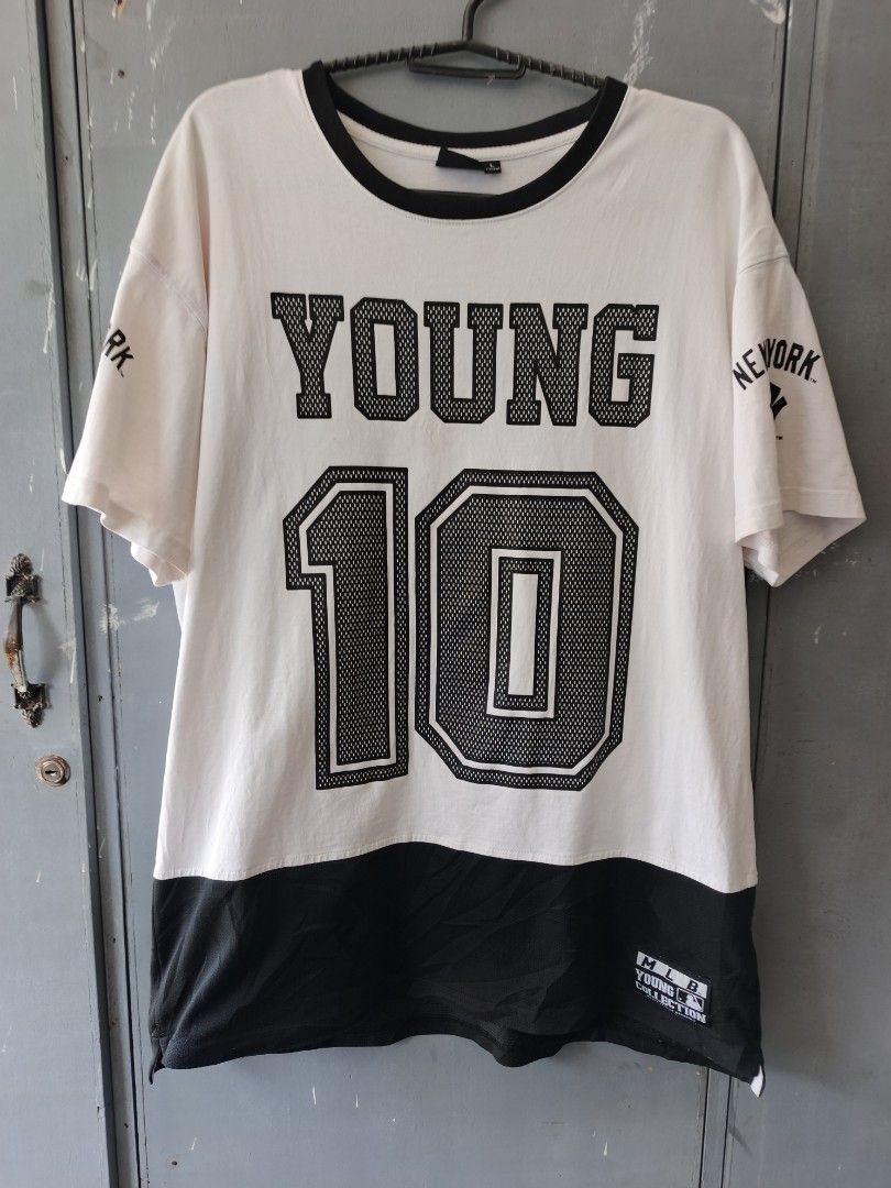 MLB T-shirt (Category: Activewear) located in Odiongan. Submitted by thriftngo26 (Listing ID 1465395058, Image 3). Description: This is a white and black short-sleeve athletic t-shirt featuring the word "YOUNG" and the number "10" on the front.