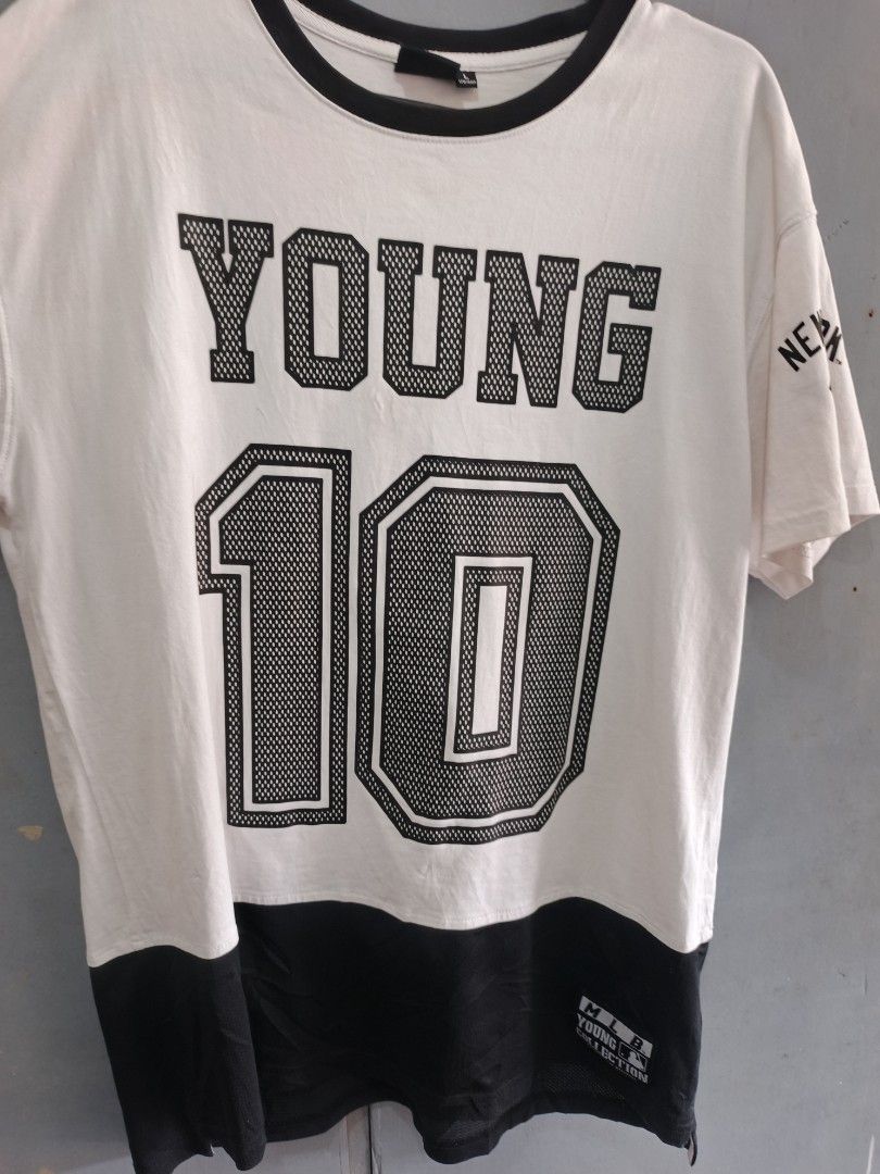 MLB T-shirt (Category: Activewear) located in Odiongan. Submitted by thriftngo26 (Listing ID 1465395058, Image 1). Description: This is a white and black short-sleeve athletic t-shirt featuring the word "YOUNG" and the number "10" on the front.