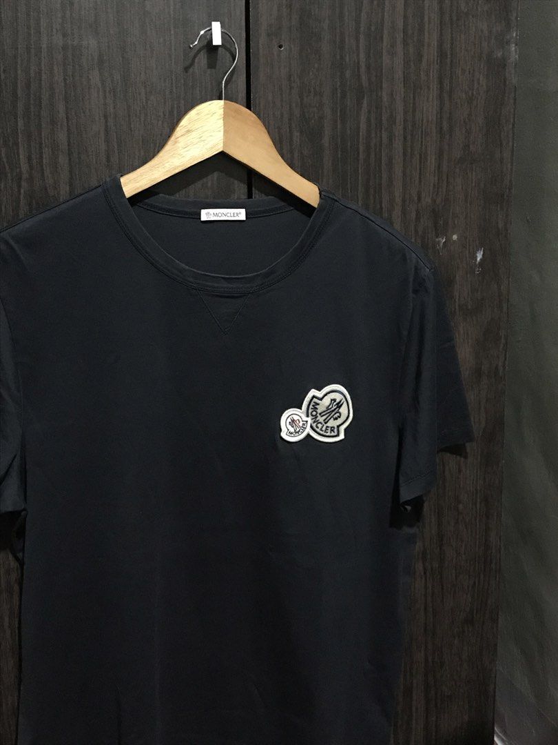 Moncler Double Logo Patch Shirt (Category: Luxury Apparel) located in Bulacan. Submitted by dailybumps (Listing ID 1465395681, Image 1). Description: 21x27 Authentic No issue - Understated luxury with a signature touch. Moncler tee featuring the distinctive double logo detail for a clean premium look. - Make room in your wardrobe for a modern luxury staple. Moncler tee with signature double logo accents. - For a quiet luxury vibe that still stand