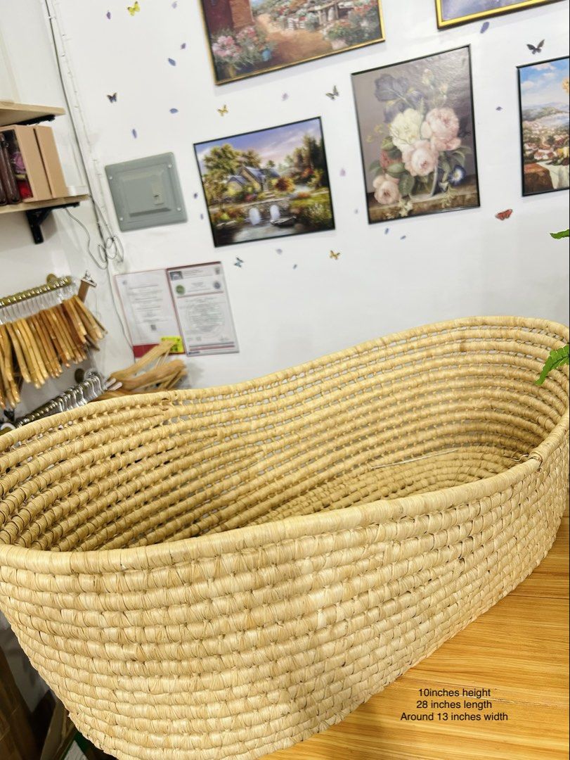 Moses Basket (Category: Vintage Collectibles) located in Bustos. Submitted by gthings.collectibles (Listing ID 1465469121, Image 2). Description: Minimalist & Aesthetic Boho Vibe for your Nursery! ✨🧺 Yours for only ₱580 !! Bigyan si baby ng pinakapresko at picture-perfect spot gamit itong artisan-crafted Natural Fiber Moses Basket (28” x 10”)! Perfect sa Team Kahoy / Team Puti setup. Common Uses & Paano Gamitin: • Newborn Day Bed: Safe at maaliw