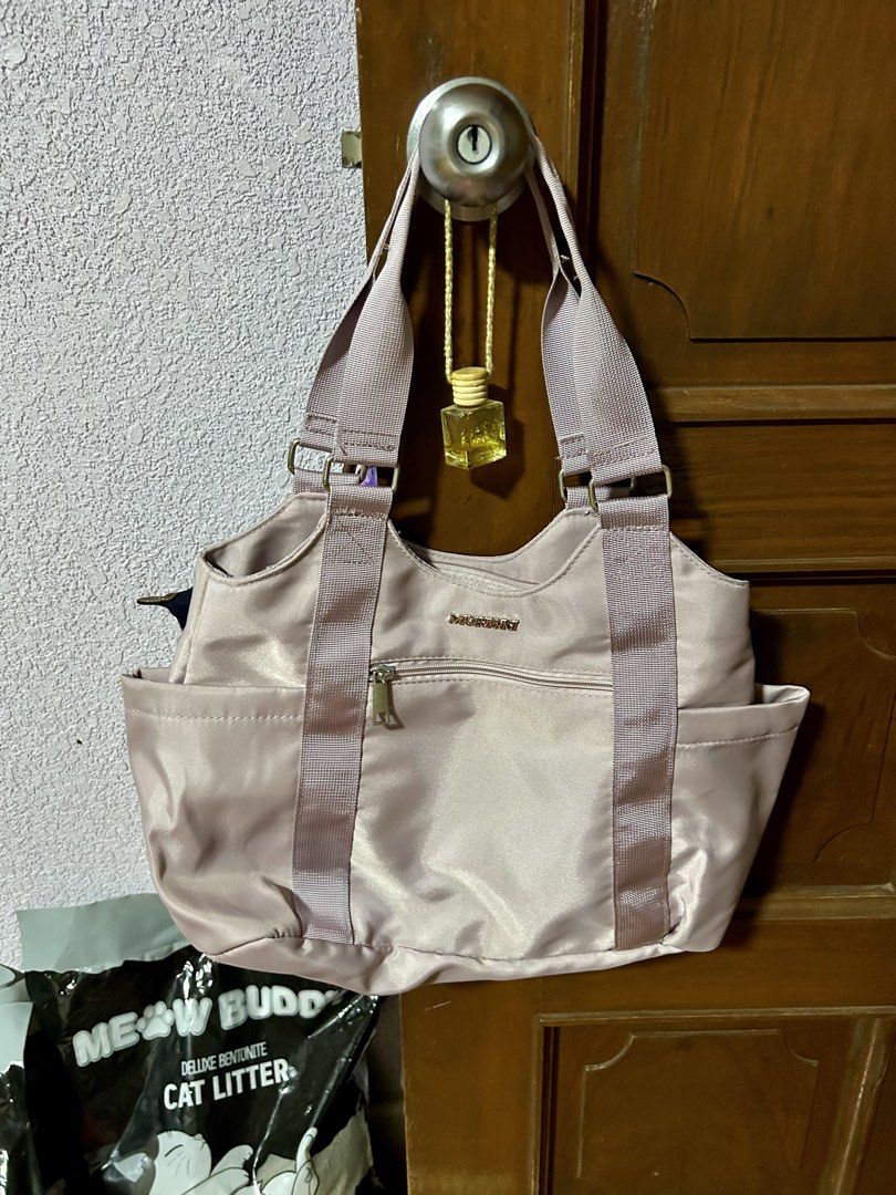 Murioki Pink Nylon Shoulder Tote Bag (Category: Shoulder Bags) located in Makati City. Submitted by monicavazquez (Listing ID 1465482667, Image 1). Description: Chic Murioki tote bag in dusty pink nylon. Features sturdy handles, shoulder straps, multiple pockets, and gold hardware. Spacious and secure with a main zip closure—perfect for daily use!.