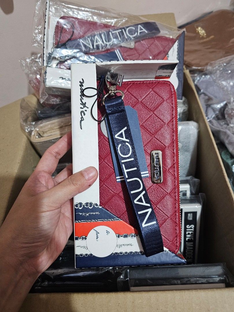 NAUTICA Long Wallet (Category: Wallets & Card holders) located in Quezon City. Submitted by senyoramaria2 (Listing ID 1465561741, Image 1). Description: NAUTICA Long Wallet With RFID Blocking Protection 2 pcs available #USpasabuy.