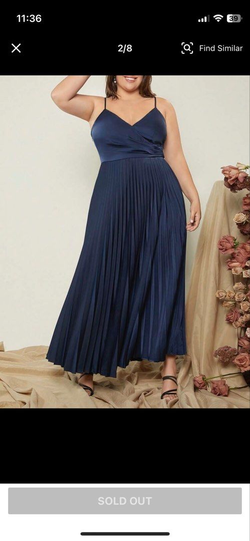 Plus Size Navy Blue Pleated Formal Evening Dress (Category: Evening dresses & gowns) located in Las Pinas. Submitted by archivedfinds (Listing ID 1465527768, Image 2). Description: Navy blue maxi dress with spaghetti straps and a v-neckline. Cross-over bodice with soft gathers at the waist. Long pleated skirt flows down to the ankles. Worn twice for an event, dry cleaned and ready to wear. Zipper closure on the side. Bust: 40-42” Waist: 33-35” RF