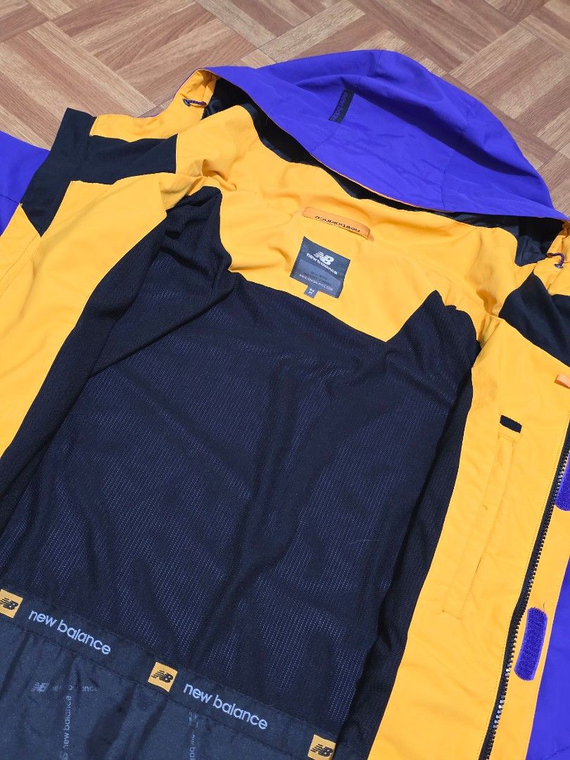 New Balance Windbreaker (Category: Coats, Jackets and Outerwear) located in Manila. Submitted by gilbert0522 (Listing ID 1465530049, Image 3). Description: • Purple x Orange NB Windbreaker • Color rate: 10/10 • Issue: None • Size: 22x28 • NEGOTIABLE TO SURE BUYER YOU CAN CHECK MY OTHER LISTINGS 👕 All Authentic/Original Preloved from South Korea 📍Sampaloc, Manila 🚚 JNT/Lalamove.