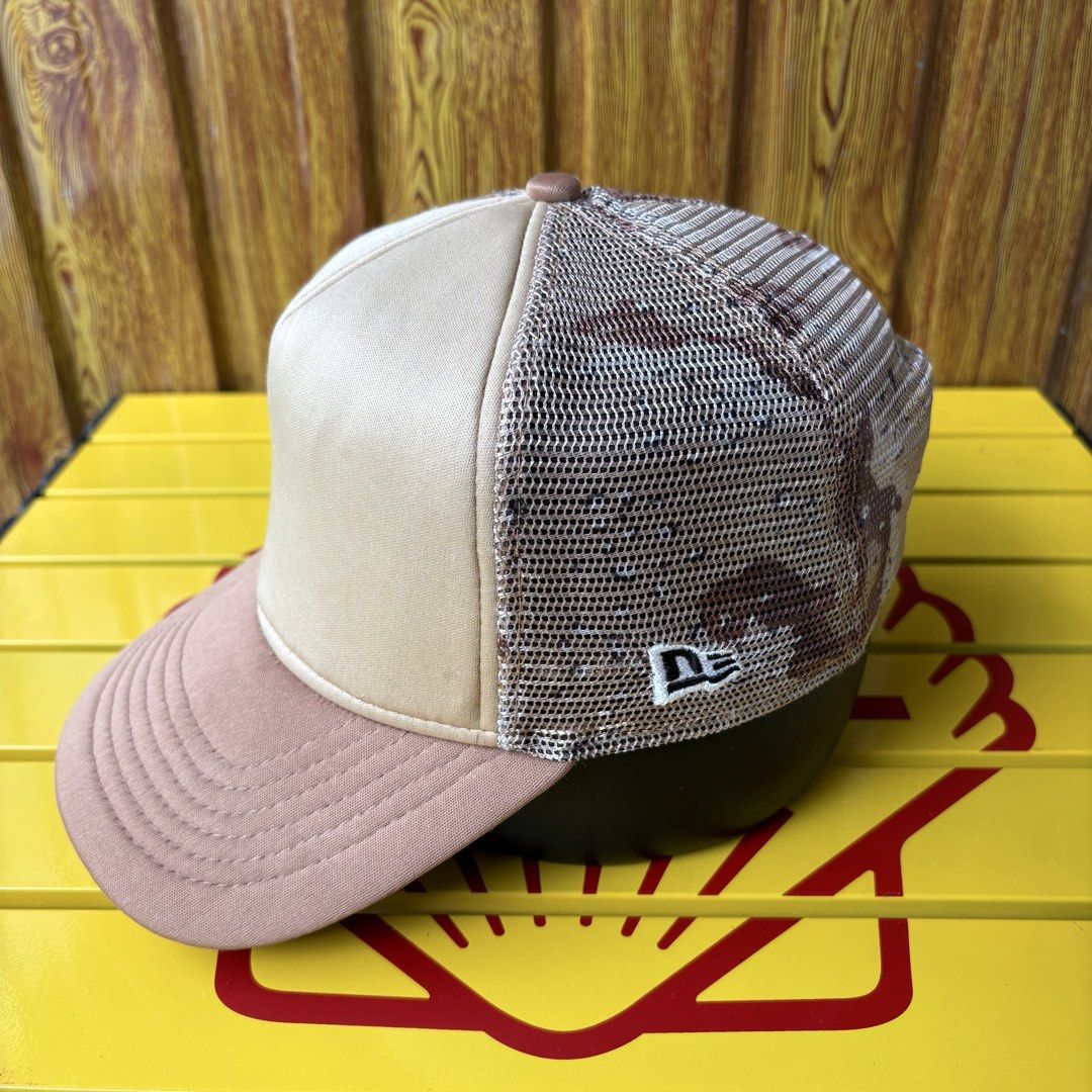 New Era Trucker Cap Khaki Brown (Category: Caps & Hats) located in Dapitan. Submitted by payt3es_thrift. (Listing ID 1465392472, Image 3). Description: New Era trucker hat in khaki and brown tones. Mesh back panel for breathability and snapback closure at the rear for an adjustable fit. Solid front panels with small New Era logo tag on the lower left. Curved brim in solid brown. Clean interior lining with brand tape along the seams..