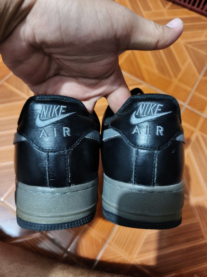 Nike Air Force 1 Black Grey US 8 (Category: Sneakers) located in Manila. Submitted by dyastenthrift (Listing ID 1465418921, Image 2). Description: - Brand/Model: Nike Air Force 1 Low - Colorway: Black with Grey Swoosh and matching grey midsole - Size: US 8 / UK 7 / EUR 41 / CM 26 - Style Code: DM4162-001 - Production Date: May 2022 (Made in Vietnam) - Condition: Pre-loved with toe box creasing and minor scuff marks near the front - Inclusion: Bla