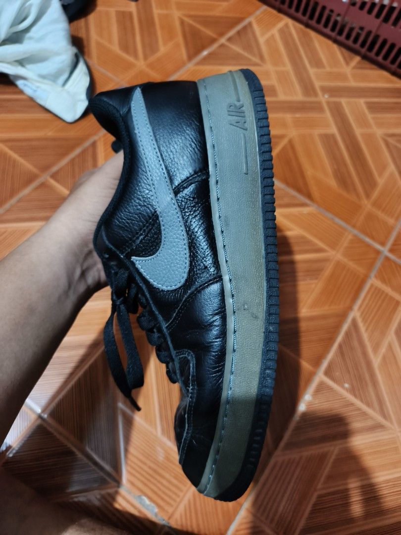 Nike Air Force 1 Black Grey US 8 (Category: Sneakers) located in Manila. Submitted by dyastenthrift (Listing ID 1465418921, Image 3). Description: - Brand/Model: Nike Air Force 1 Low - Colorway: Black with Grey Swoosh and matching grey midsole - Size: US 8 / UK 7 / EUR 41 / CM 26 - Style Code: DM4162-001 - Production Date: May 2022 (Made in Vietnam) - Condition: Pre-loved with toe box creasing and minor scuff marks near the front - Inclusion: Bla