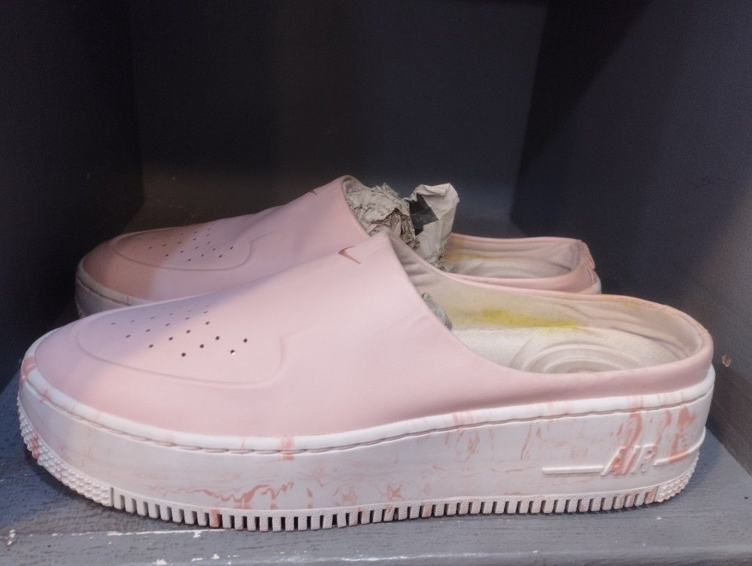 Nike Air Force 1 Lover XX Mules (Category: Flats & Sandals) located in Manila. Submitted by iamnicka (Listing ID 1465534353, Image 2). Description: Nike Air Force 1 Lover XX mules in pink. Part of the limited edition 1 Reimagined series. Slip-on design with platform sole and marble pattern details. Newspaper stuffing inside for shape. Some yellowing on the inner insoles from age. Rare sneaker mule silhouette..