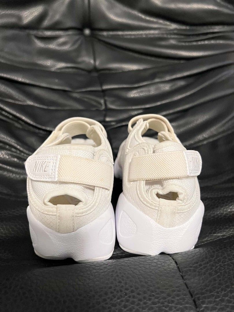 Nike Air Rift Br White Split Toe Sneakers Size US 7 (Category: Sneakers) located in Quezon City. Submitted by idk.uno (Listing ID 1465529805, Image 3). Description: - Brand/Model: Nike Air Rift Breathe - Colorway: Triple White - Size: US [Insert Size] - Condition: Excellent, worn lightly with minimal signs of wear - Features: Iconic split-toe design, adjustable hook-and-loop straps at midfoot and heel, breathable mesh upper, and chunky foam midso