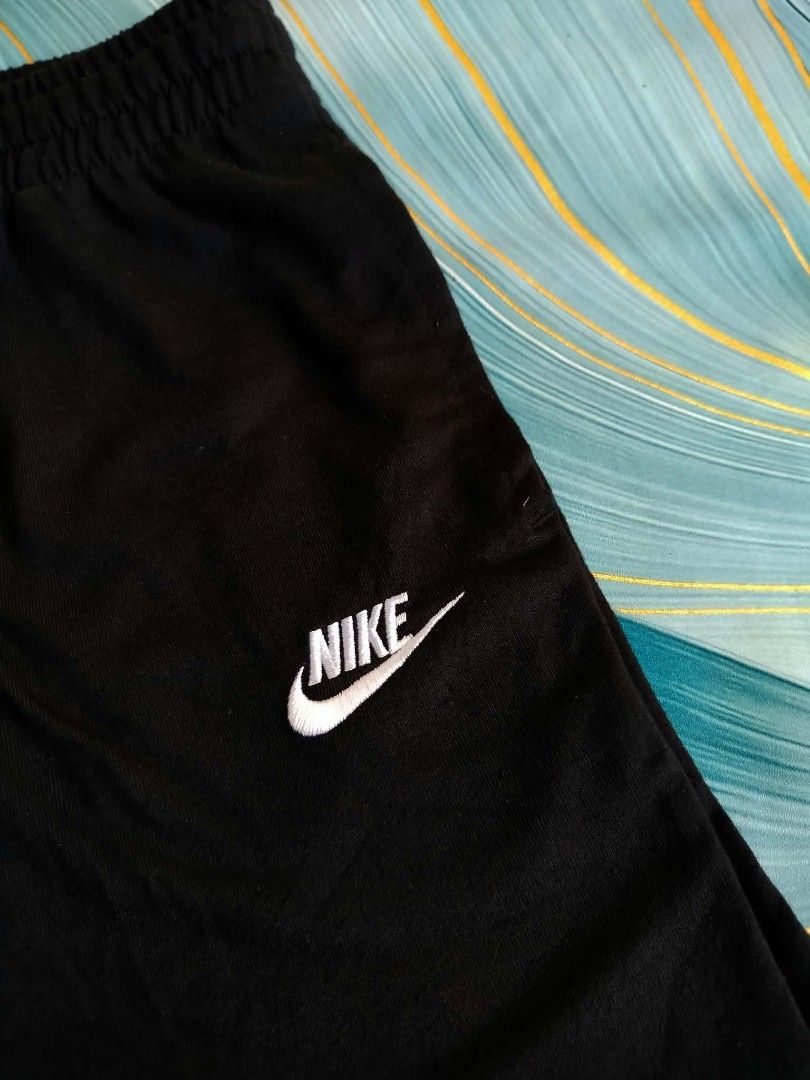 Nike Black Athletic Shorts Size M (Category: Shorts) located in Manila. Submitted by virgiliosa38485 (Listing ID 1465499697, Image 2). Description: - Brand: Nike - Color: Classic Black - Size: Men's Medium -Waist 26-30 -Length 15 - Origin: Made in Vietnam - Style Code: DA0806-010 - Features: Elastic waistband, adjustable drawstring, and white embroidered Nike logo near the hem - Condition: Comfort-focused sportswear staple, perfect for workouts o