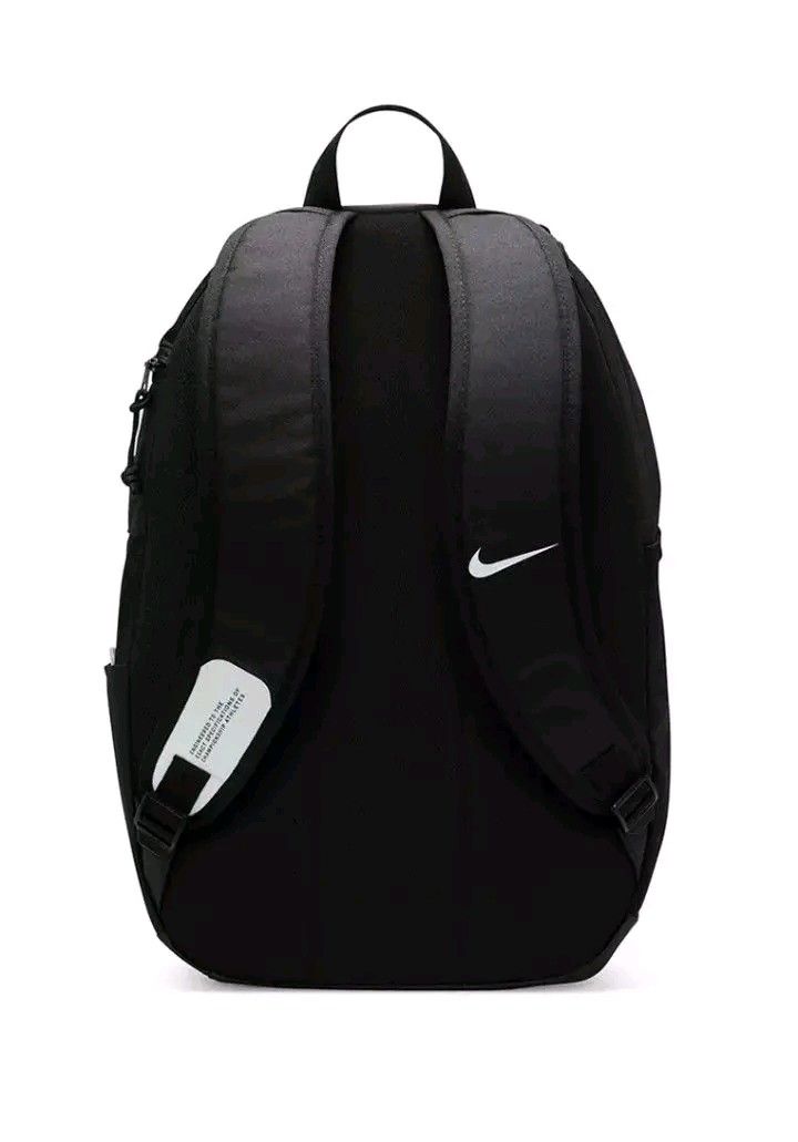 Nike Black Backpack with White Swoosh Logo (Category: Backpacks) located in Marikina City. Submitted by geloboixxx (Listing ID 1465465110, Image 3). Description: - Color: Sleek black with a striking white curved logo panel on the front - Storage: Spacious main compartment with top flap closure and a convenient side zipper pocket - Comfort & Portability: Sturdy, adjustable shoulder straps with a subtle Nike swoosh and a handy top handle - Material