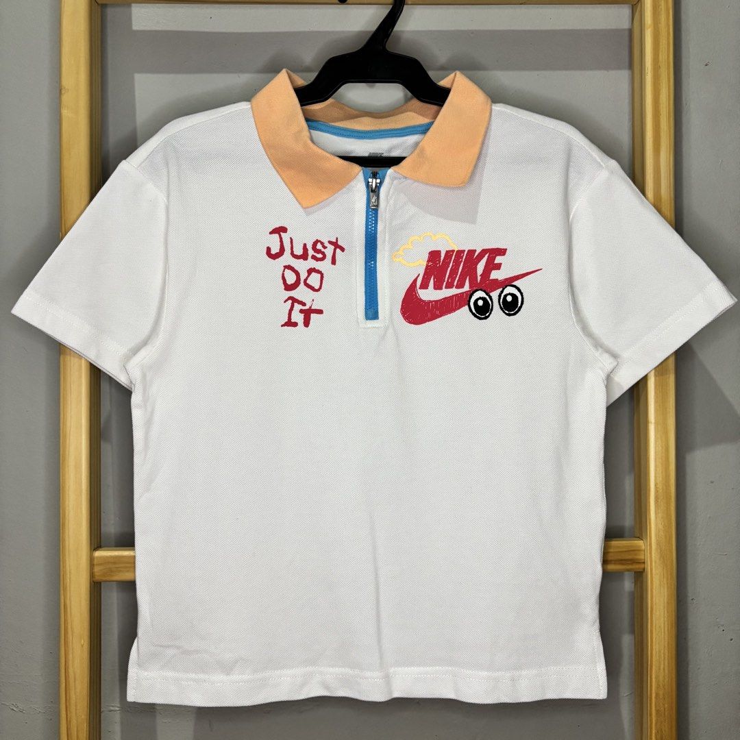Nike kids half zip polo shirt (Category: Babies & Kids Fashion) located in Valenzuela. Submitted by thriftynanay88 (Listing ID 1465450129, Image 1). Description: Size 7Y on tag.