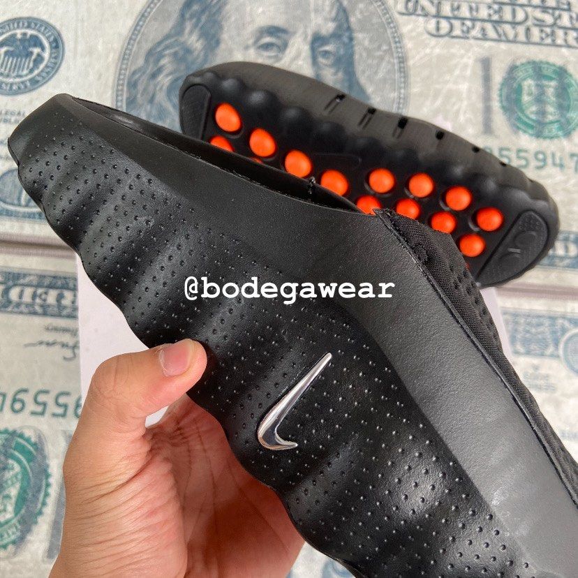 Nike Mind Slides Black Orange (Category: Slippers & Slides) located in Manila. Submitted by bodegawear_mnl (Listing ID 1465409235, Image 2). Description: - Model: Nike Mind Slides - Colorway: Black and Vibrant Orange - Design: Slip-on mule silhouette with a unique podular outsole and silver side Swoosh - Condition: Brand new with original Nike Mind box and tags - Perfect for daily casual wear or adding a pop of color to your fit.