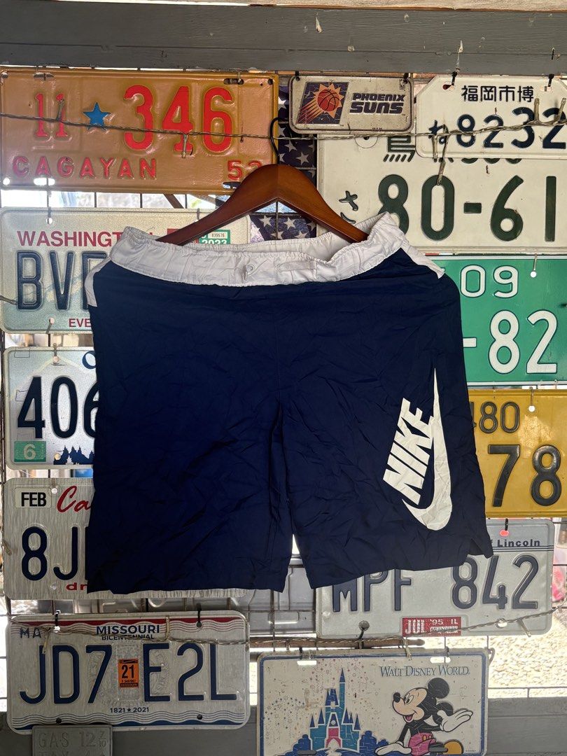 Nike Navy Blue Shorts Large (Category: Shorts) located in Tuguegarao City. Submitted by urdailyhabitat (Listing ID 1465424228, Image 1). Description: - Brand: Nike - Color: Navy blue with large white leg logo - Size: Large - Waistband: White elastic for a comfortable fit - Condition: Clean overall - Style Code: CT9485-492 - Origin: Made in China.