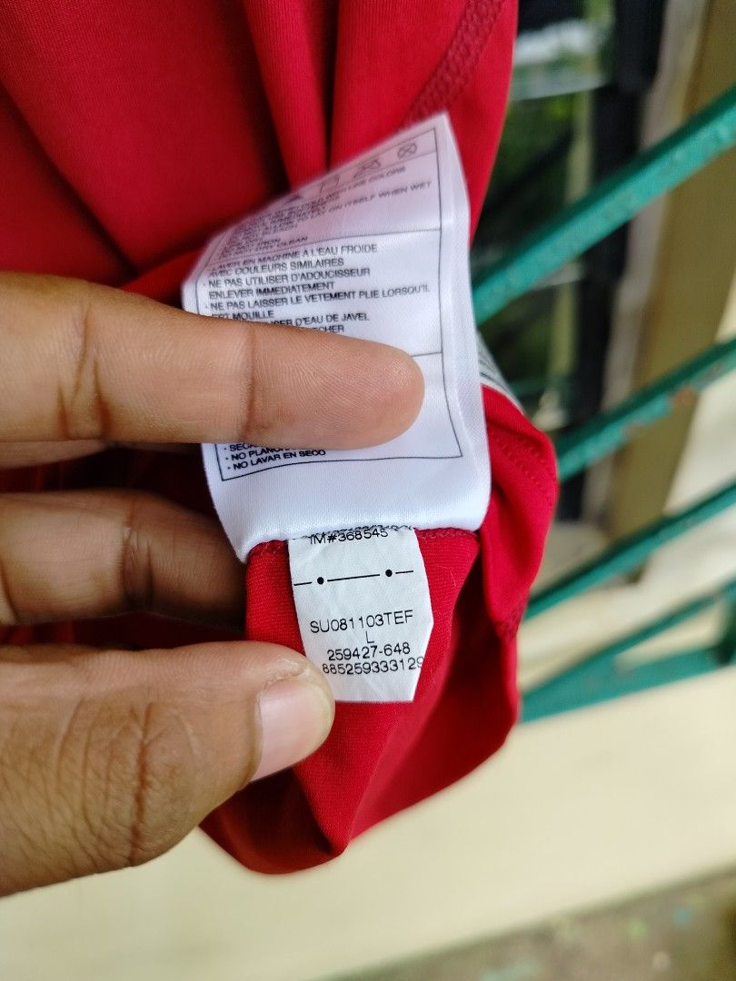 Nike Pro Tight Sleeveless Red Tank Top (Category: Activewear) located in Manila. Submitted by gerald_quinto (Listing ID 1465472952, Image 3). Description: - Brand: Nike Pro - Color: Bright red with gray collar trim - Size: Large (L) - Fit: Tight, athletic fit - Material: Lightweight and breathable - Condition: Authentic with clear tag details visible.