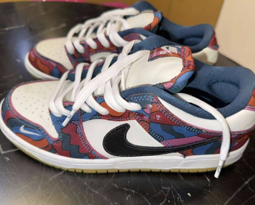 Nike SB Dunk Low Pro Parra Abstract Art (Category: Sneakers) located in Pasig City. Submitted by balsamo.hrdms (Listing ID 1465404984, Image 1). Description: - Model: Nike SB Dunk Low Pro x Parra "Abstract Art" - Design: White leather base with signature colorful abstract art overlays and black swoosh - Sole: Classic gum rubber outsole with minimal wear on treads - Condition: Clean uppers, well-maintained, great for daily rotation or display No B
