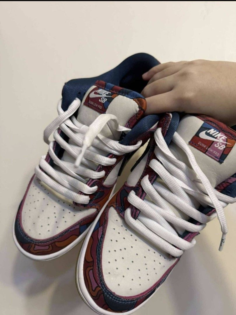 Nike SB Dunk Low Pro Parra Abstract Art (Category: Sneakers) located in Pasig City. Submitted by balsamo.hrdms (Listing ID 1465404984, Image 2). Description: - Model: Nike SB Dunk Low Pro x Parra "Abstract Art" - Design: White leather base with signature colorful abstract art overlays and black swoosh - Sole: Classic gum rubber outsole with minimal wear on treads - Condition: Clean uppers, well-maintained, great for daily rotation or display No B