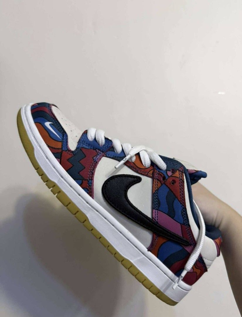 Nike SB Dunk Low Pro Parra Abstract Art (Category: Sneakers) located in Pasig City. Submitted by balsamo.hrdms (Listing ID 1465404984, Image 3). Description: - Model: Nike SB Dunk Low Pro x Parra "Abstract Art" - Design: White leather base with signature colorful abstract art overlays and black swoosh - Sole: Classic gum rubber outsole with minimal wear on treads - Condition: Clean uppers, well-maintained, great for daily rotation or display No B