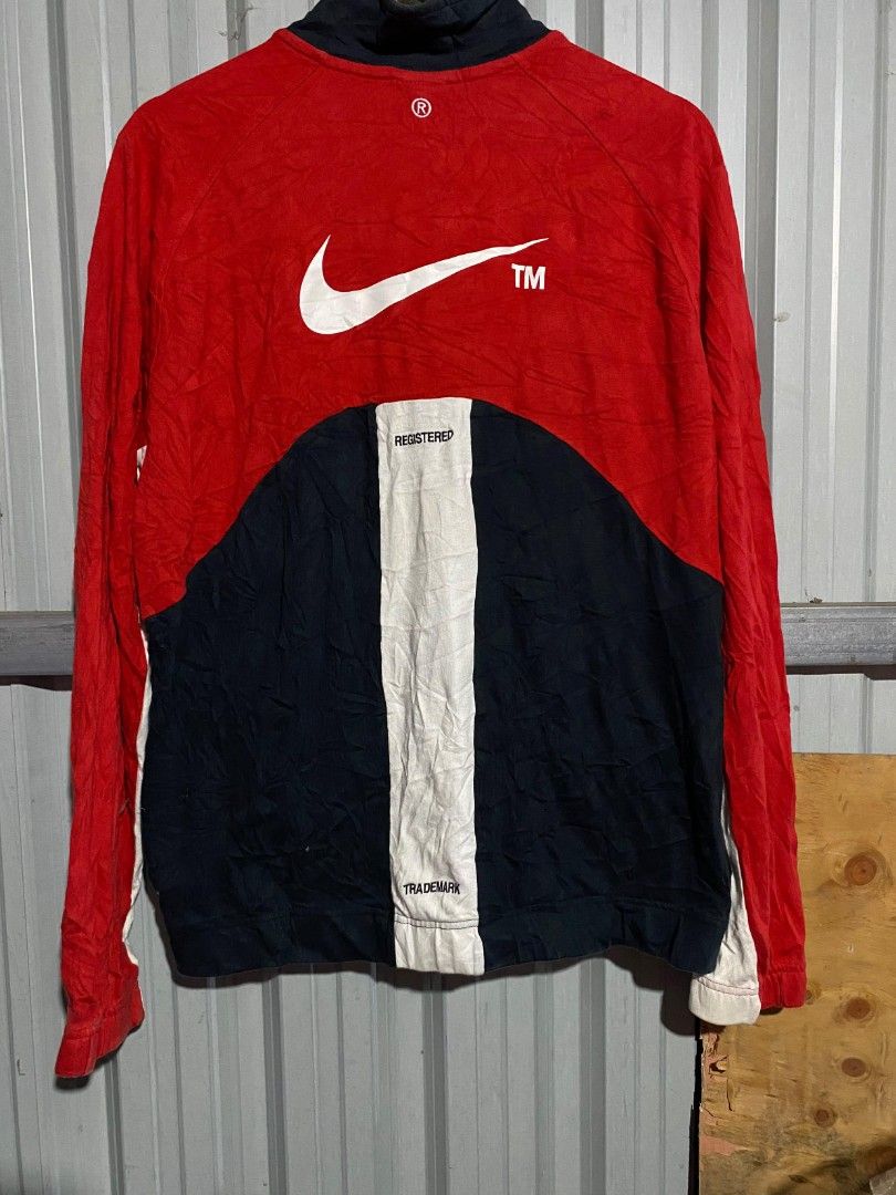 Nike Vintage Colorblock Full Zip Track Jacket (Category: Coats, Jackets and Outerwear) located in Bacolod City. Submitted by carlo1019 (Listing ID 1465385198, Image 2). Description: - Brand: Nike - Style: Full-zip colorblock jacket (Red/Black/White) - Size: XL - Details: High collar neckline, white Swoosh printed on chest and back, registered trademark text on rear lower panel - Style Code: DD5982-657 - Condition: 100% authentic and well-maintain