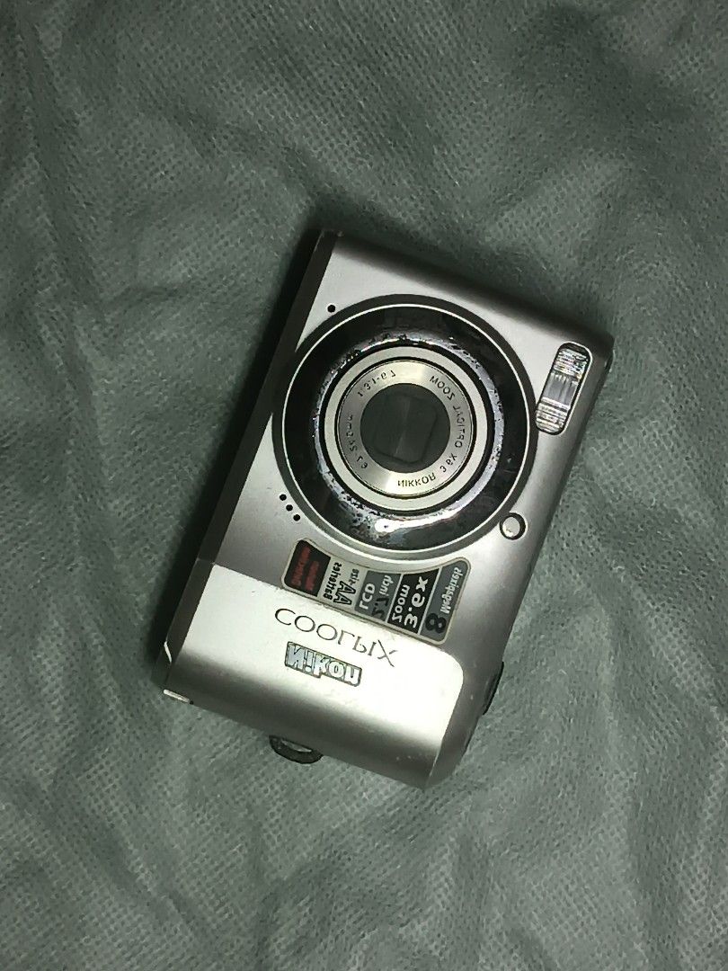 Nikon Coolpix L19 - 8 Megapixel Digital Camera (Category: Cameras) located in Manila. Submitted by pureshark.686cbe (Listing ID 1465578533, Image 1). Description: NEGOTIABLE! - Model: Silver Nikon Coolpix Digital Camera - Resolution: 8 Megapixels with 3.6x Optical Zoom - Display: 2.7-inch LCD screen - Power Source: Uses standard AA batteries (very convenient!) - Condition: Powers on and takes clear photos, with some normal scuffs and wear on the 