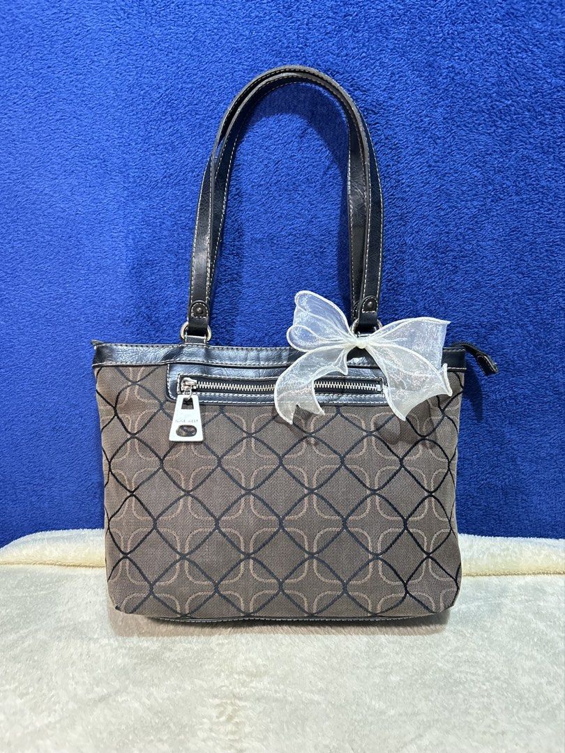 NINE WEST SMALL TOTE CANVAS LEATHER (Category: Shoulder Bags) located in Manila. Submitted by declutter_lala (Listing ID 1465516902, Image 1). Description: Complete details on my ig @wearby_lala.