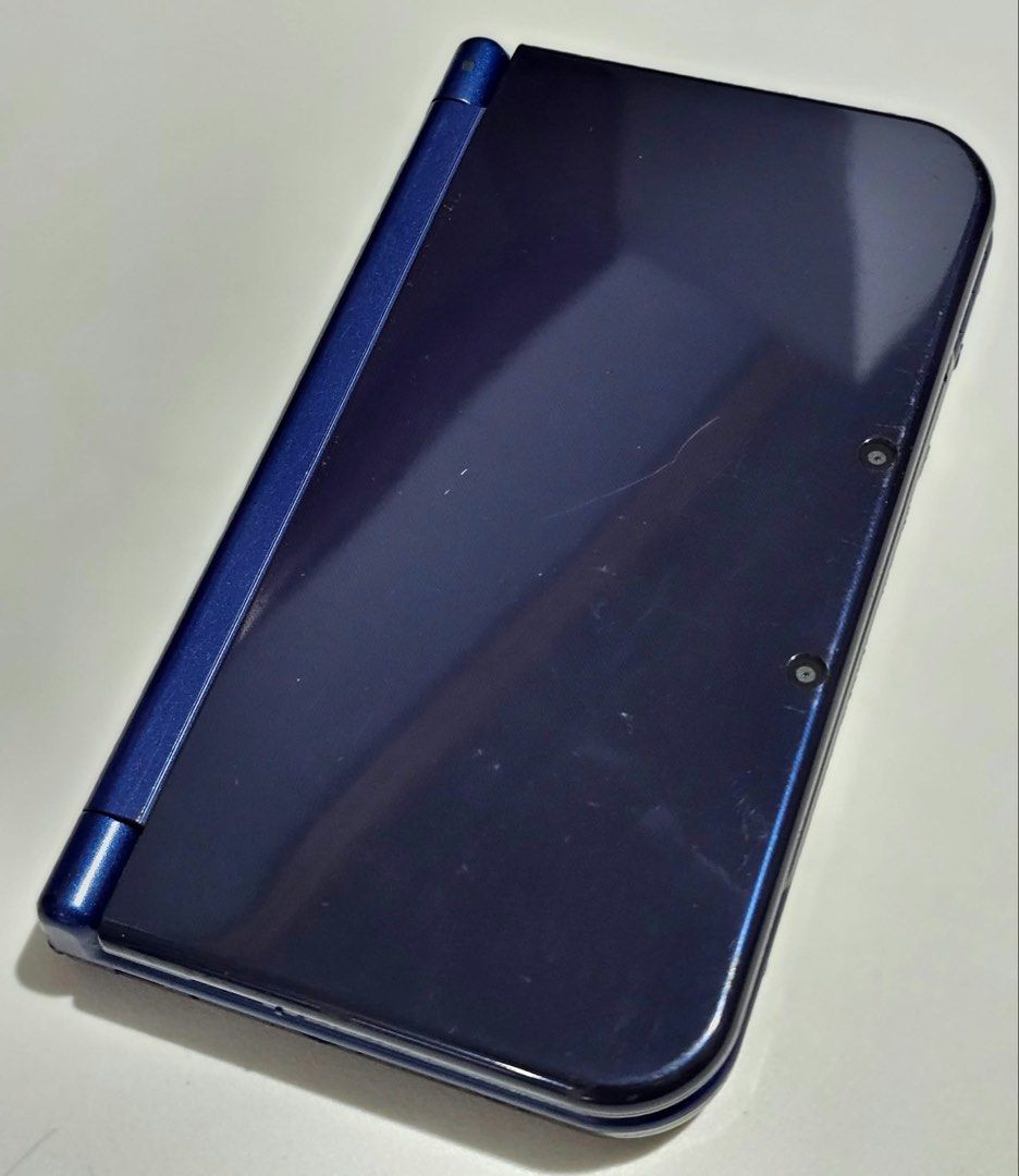Nintendo New 3DS XL IPS Top Metallic Blue (Category: Nintendo) located in Santa Rosa. Submitted by j.r.constantino (Listing ID 1465517546, Image 2). Description: 📣 For sale Nintendo New 3DS LL/XL IPS Top Metallic Blue📣 🏷️ ₱13,500 ➡️ Original console ➡️ IPS top LCD (slight vignette on the right corners, still smooth and no scratches) ➡️ TN bottom screen (slight yellowing at the right side, has some scratches) ➡️ Metallic blue color ➡️ All featu