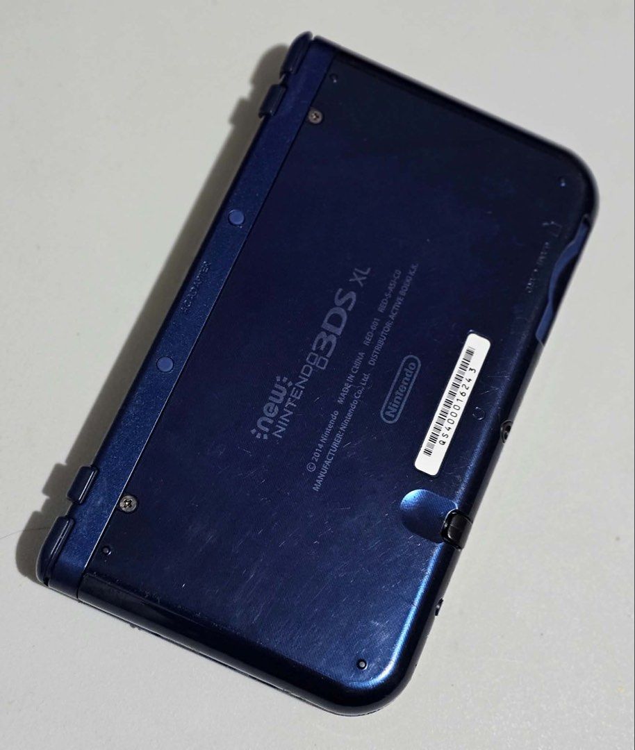 Nintendo New 3DS XL IPS Top Metallic Blue (Category: Nintendo) located in Santa Rosa. Submitted by j.r.constantino (Listing ID 1465517546, Image 3). Description: 📣 For sale Nintendo New 3DS LL/XL IPS Top Metallic Blue📣 🏷️ ₱13,500 ➡️ Original console ➡️ IPS top LCD (slight vignette on the right corners, still smooth and no scratches) ➡️ TN bottom screen (slight yellowing at the right side, has some scratches) ➡️ Metallic blue color ➡️ All featu