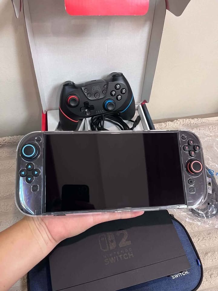NINTENDO SWITCH 2 5 MONTHS OLD (Category: Nintendo) located in Caloocan City. Submitted by princesscuenco.503 (Listing ID 1465387327, Image 3). Description: - Complete Nintendo Switch console with dock - Includes vibrant Blue and Orange Joy-Cons plus charging grip - Comes with Super Mario Bros Wonder physical game cartridge - Includes power adapter, HDMI cable, and stylish blue carrying case - Ready to play out of the box, perfect gift bundle!.