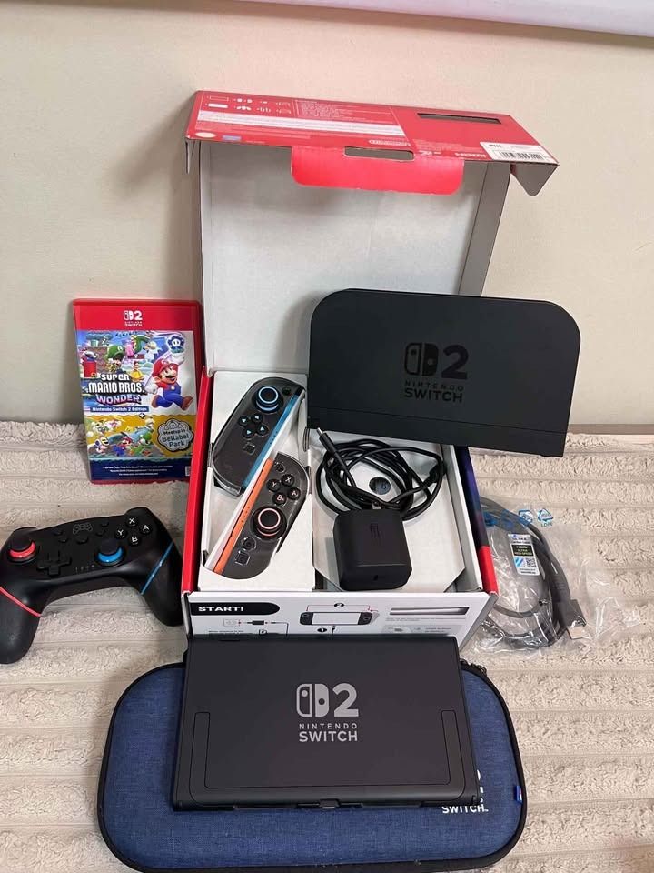 NINTENDO SWITCH 2 5 MONTHS OLD (Category: Nintendo) located in Caloocan City. Submitted by princesscuenco.503 (Listing ID 1465387327, Image 1). Description: - Complete Nintendo Switch console with dock - Includes vibrant Blue and Orange Joy-Cons plus charging grip - Comes with Super Mario Bros Wonder physical game cartridge - Includes power adapter, HDMI cable, and stylish blue carrying case - Ready to play out of the box, perfect gift bundle!.