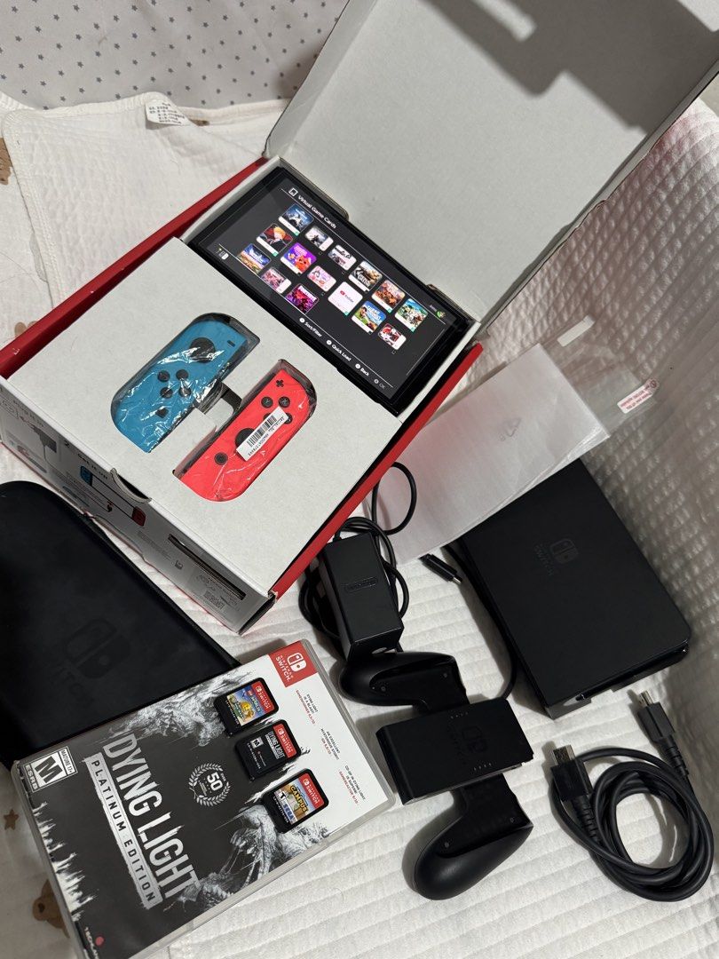 Switch OLED |clean and 95% good condition. (Category: Nintendo) located in Manila. Submitted by joms2627 (Listing ID 1465447821, Image 1). Description: NS OLED No issue, clean and 95% good condition. Inclusions: Complete Accessories 3 Physical game Extra tempered glass Pouch carrying bag 12k | South Caloocan.