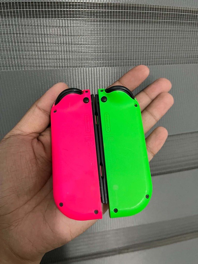 Nintendo switch joycons (Category: Controllers) located in Quezon City. Submitted by all_about_retro (Listing ID 1465500592, Image 2). Description: Nintendo switch joycons Like new Tested ok Good all buttons No ghost movements Makikinis parehas May video ako dito na all workings lahat No issue Pickup.