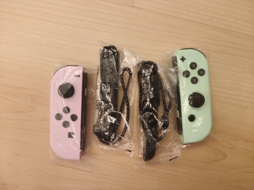 Nintendo Switch OLED Model (Category: Nintendo) located in Singapore. Submitted by binmdmx (Listing ID 1465508169, Image 1). Description: - Comes with pastel purple & pastel green Joy-Cons with black straps - Authentic White Nintendo Switch dock included - Nyko clear thin case kit for OLED models - 100% in original packaging and plastic - Fast deal preferred, PM for meetup details!.
