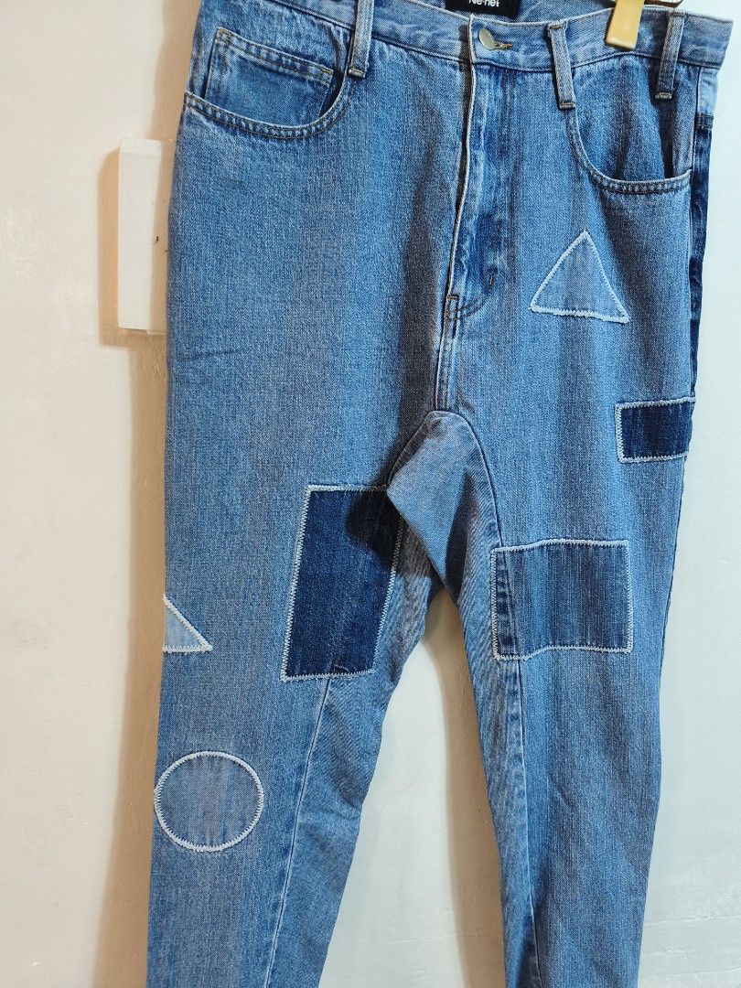 Né-net Patchwork Denim Jeans (Category: Jeans) located in Taytay. Submitted by bunsoanglo096 (Listing ID 1465413805, Image 3). Description: Size 3 on tag waist -30 length -35 - Brand: Né-net (Vintage Japanese Designer) - Style: Straight leg patchwork denim jeans with button fly and branded hardware - Wash: Medium wash blue with dark indigo block panels - Design Details: Contrast geometric shapes (triangles, squares, circles) and standout white st