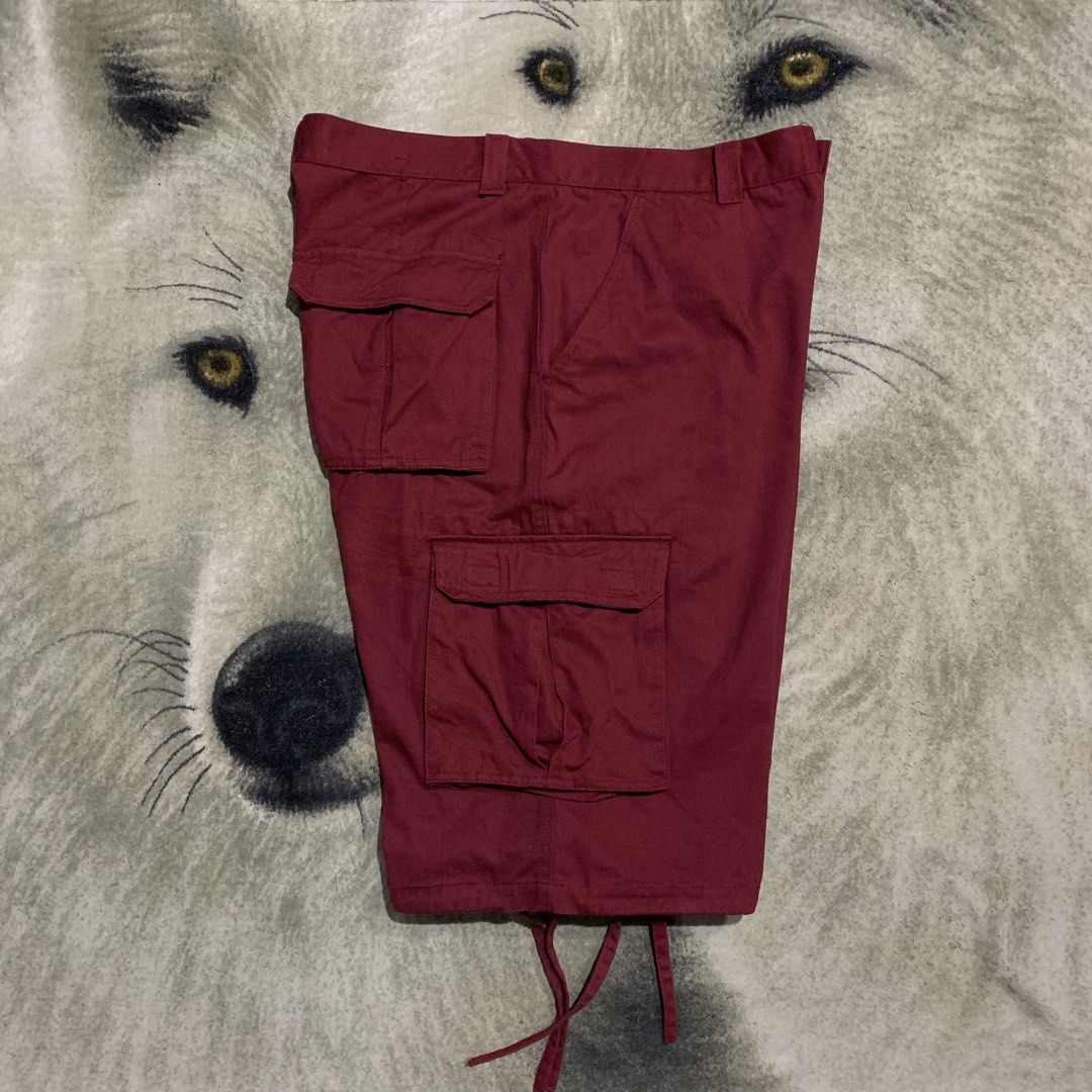 Noiz Maroon Cargo Shorts Size 38 (Category: Shorts) located in Bulacan. Submitted by puronghustlin (Listing ID 1465429500, Image 2). Description: - Brand: Noidz - Color: Maroon - Size: 38x27 - Material: Durable cotton - Features: Multiple side and back pockets, adjustable leg openings with drawstrings - Extras: Includes matching fabric belt with a D-ring buckle - Style: Great for casual streetwear - Condition: Excellent / As good as new - Fast sh