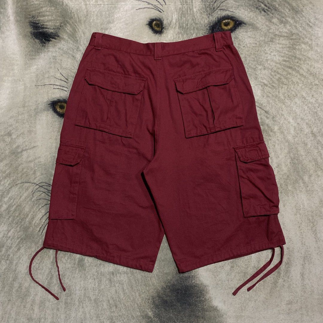 Noiz Maroon Cargo Shorts Size 38 (Category: Shorts) located in Bulacan. Submitted by puronghustlin (Listing ID 1465429500, Image 3). Description: - Brand: Noidz - Color: Maroon - Size: 38x27 - Material: Durable cotton - Features: Multiple side and back pockets, adjustable leg openings with drawstrings - Extras: Includes matching fabric belt with a D-ring buckle - Style: Great for casual streetwear - Condition: Excellent / As good as new - Fast sh