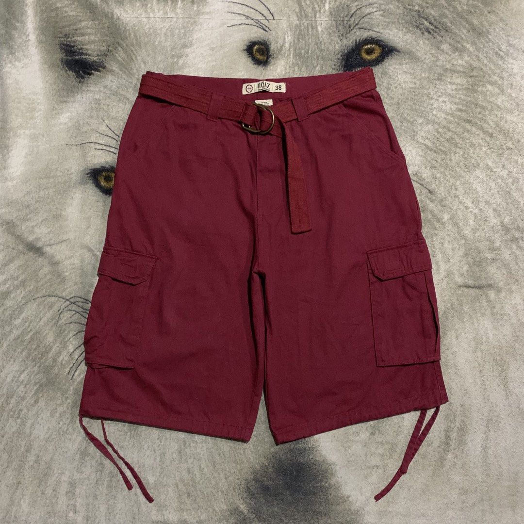 Noiz Maroon Cargo Shorts Size 38 (Category: Shorts) located in Bulacan. Submitted by puronghustlin (Listing ID 1465429500, Image 1). Description: - Brand: Noidz - Color: Maroon - Size: 38x27 - Material: Durable cotton - Features: Multiple side and back pockets, adjustable leg openings with drawstrings - Extras: Includes matching fabric belt with a D-ring buckle - Style: Great for casual streetwear - Condition: Excellent / As good as new - Fast sh