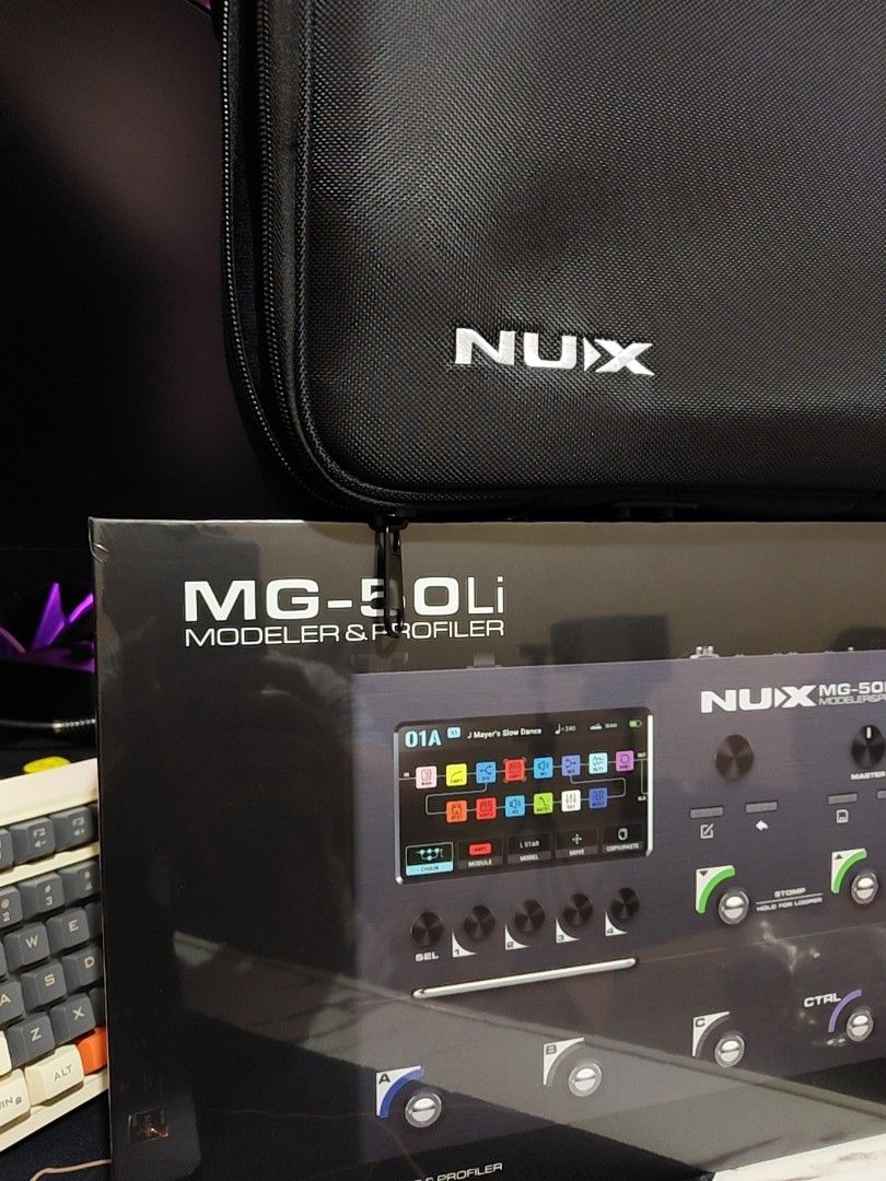 NUX MG-50Li Modeler & Profiler (Category: Musical Instruments) located in Caloocan City. Submitted by arronsly (Listing ID 1465417633, Image 2). Description: BRANDNEW BRANDNEW FREE PROTECTOR FREE BAG FREE UPDATE FREE PRESET - Brand/Model: NUX MG-50Li guitar modeler and profiler - Color/Mods: White finish with orange footswitch toppers installed - Features: Multi-effects processor and IR loader for electric guitar - Condition: Fully functional gea