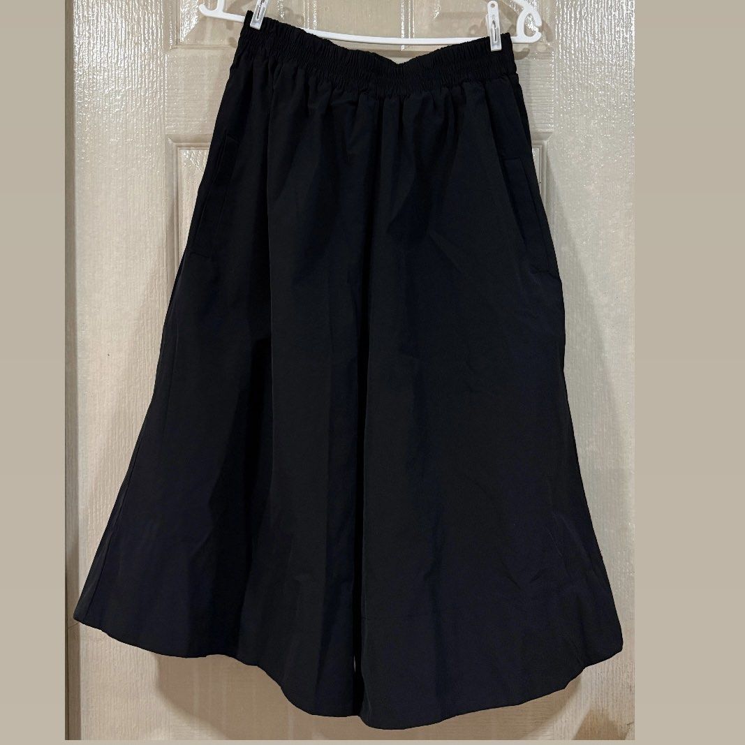 Nylon Culottes Pants with pockets (Category: Skirts) located in Makati City. Submitted by julyco. (Listing ID 1465448302, Image 1). Description: - Color: Classic Black - Waistband: Comfortable elastic - Design: Stylish look with functional side pockets - Fabric: Lightweight for all-day comfort - Versatility: Perfect for everyday wear, easily matches with tees and blouses.