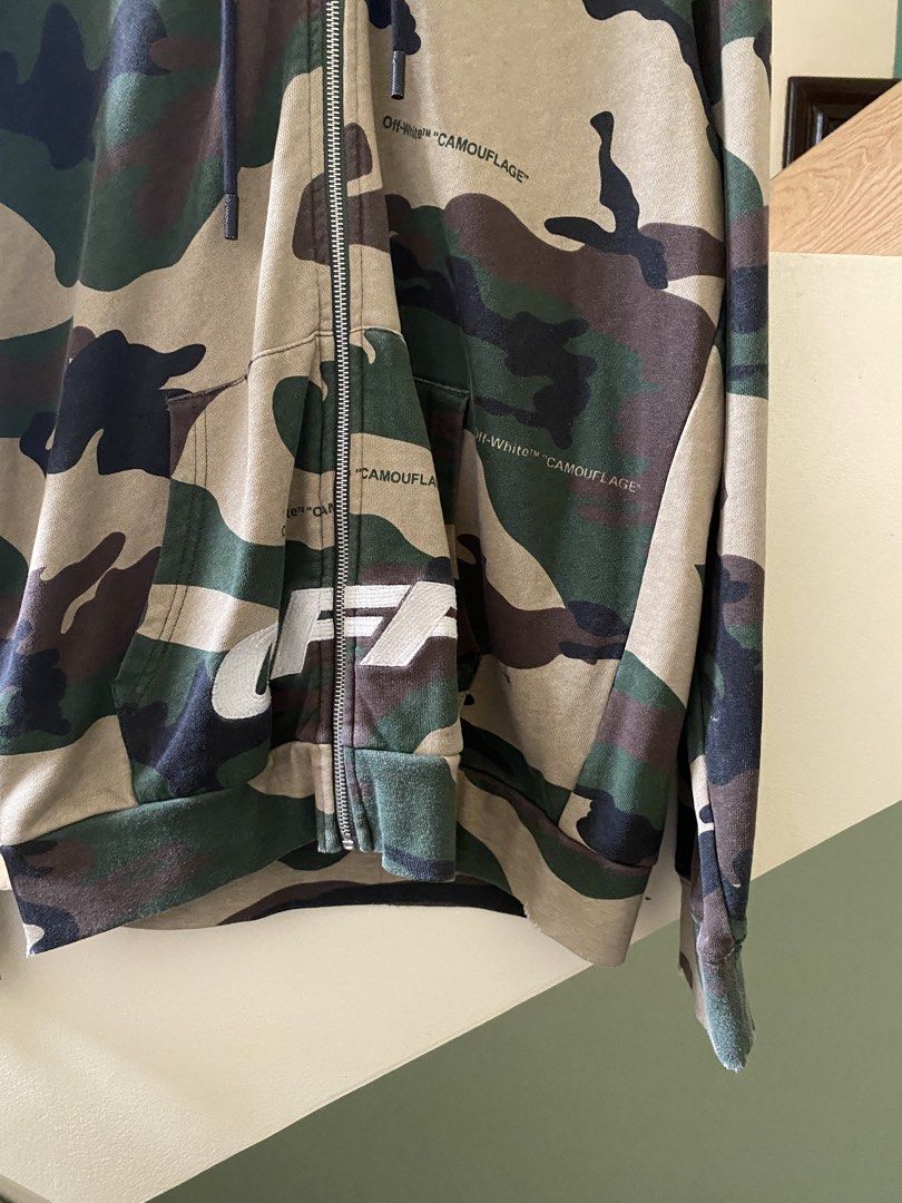 Off-White - Camo Zip Hoodie (Category: Hoodies) located in Puerto Princesa. Submitted by something___. (Listing ID 1465508929, Image 3). Description: Off-White - Camo Zip Hoodie Tagged Size: Small (Dimension) Length: 28.5 Width: 23 Condition: Excellent Color rate: 9.4 Flaws: None.