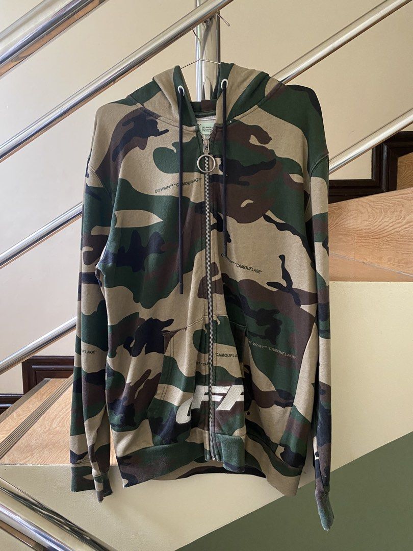 Off-White - Camo Zip Hoodie (Category: Hoodies) located in Puerto Princesa. Submitted by something___. (Listing ID 1465508929, Image 1). Description: Off-White - Camo Zip Hoodie Tagged Size: Small (Dimension) Length: 28.5 Width: 23 Condition: Excellent Color rate: 9.4 Flaws: None.