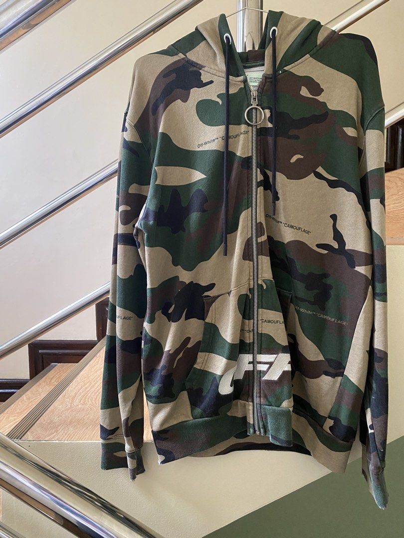 Off-White - Camo Zip Hoodie (Category: Hoodies) located in Puerto Princesa. Submitted by something___. (Listing ID 1465508929, Image 2). Description: Off-White - Camo Zip Hoodie Tagged Size: Small (Dimension) Length: 28.5 Width: 23 Condition: Excellent Color rate: 9.4 Flaws: None.