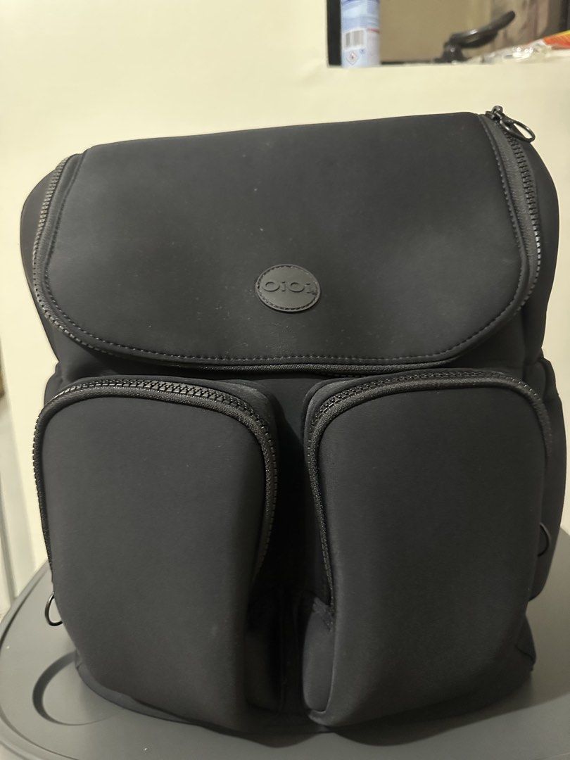 Oioi Diaper Bag Mom Bag (Category: Backpacks) located in Manila. Submitted by hellopanda_07 (Listing ID 1465530407, Image 2). Description: - Brand: OiOi (Australian Brand) ordered via their website. - Material: Durable and lightweight black neoprene - 10/10 condition! - super saglit lang nagamit. - with diaper changing pad and insulated bag included .
