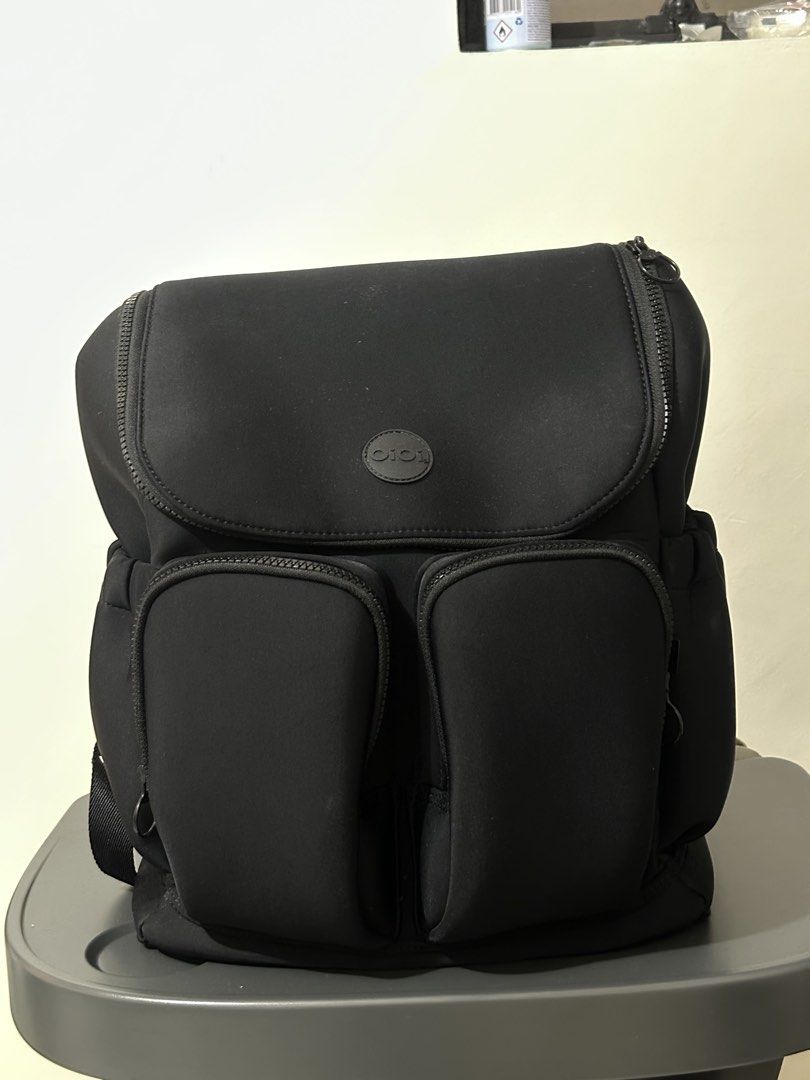 Oioi Diaper Bag Mom Bag (Category: Backpacks) located in Manila. Submitted by hellopanda_07 (Listing ID 1465530407, Image 1). Description: - Brand: OiOi (Australian Brand) ordered via their website. - Material: Durable and lightweight black neoprene - 10/10 condition! - super saglit lang nagamit. - with diaper changing pad and insulated bag included .
