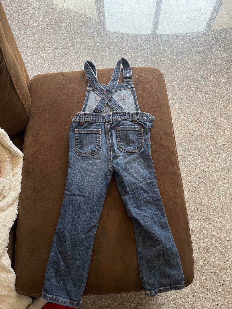 Old Navy Denim Overalls Size 3T (Category: Babies & Kids Fashion) located in Carmona. Submitted by abimeng08 (Listing ID 1465444207, Image 2). Description: Old Navy denim overalls for toddlers. Size 3T. Adjustable shoulder straps with metal buttons. Classic blue wash with pink contrast stitching accents. Front bib pocket, side pockets, and back pockets. Button closures on the sides. Made in Bangladesh..