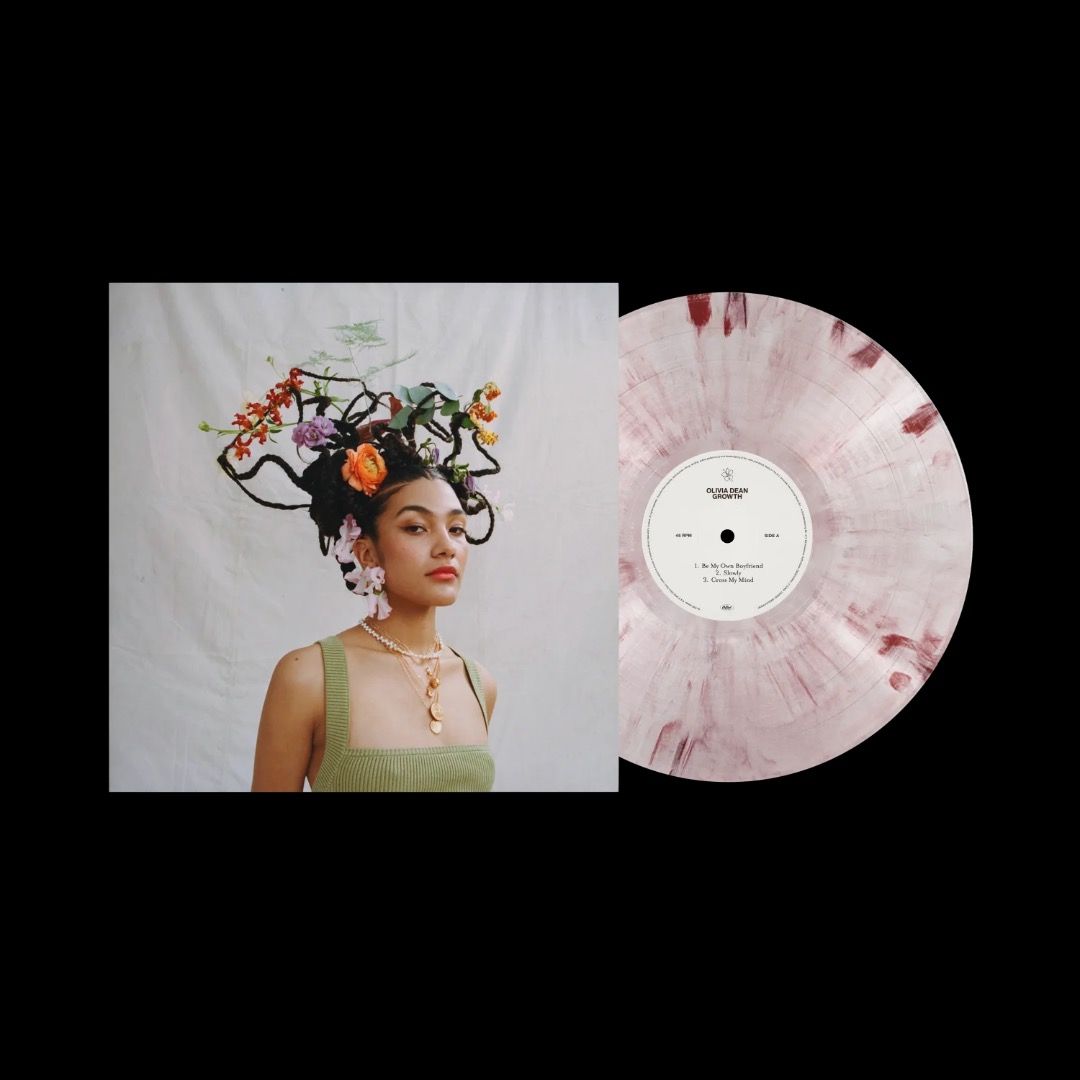 Olivia Dean - Growth (10” Pink Marble) (Category: Vinyls) located in Quezon City. Submitted by jericfinds07_153 (Listing ID 1465510373, Image 1). Description: Olivia Dean - Growth (10” Pink Marble) Sealed 2,399php only Can ship via lalamove. Loc: Diliman, Quezon City.