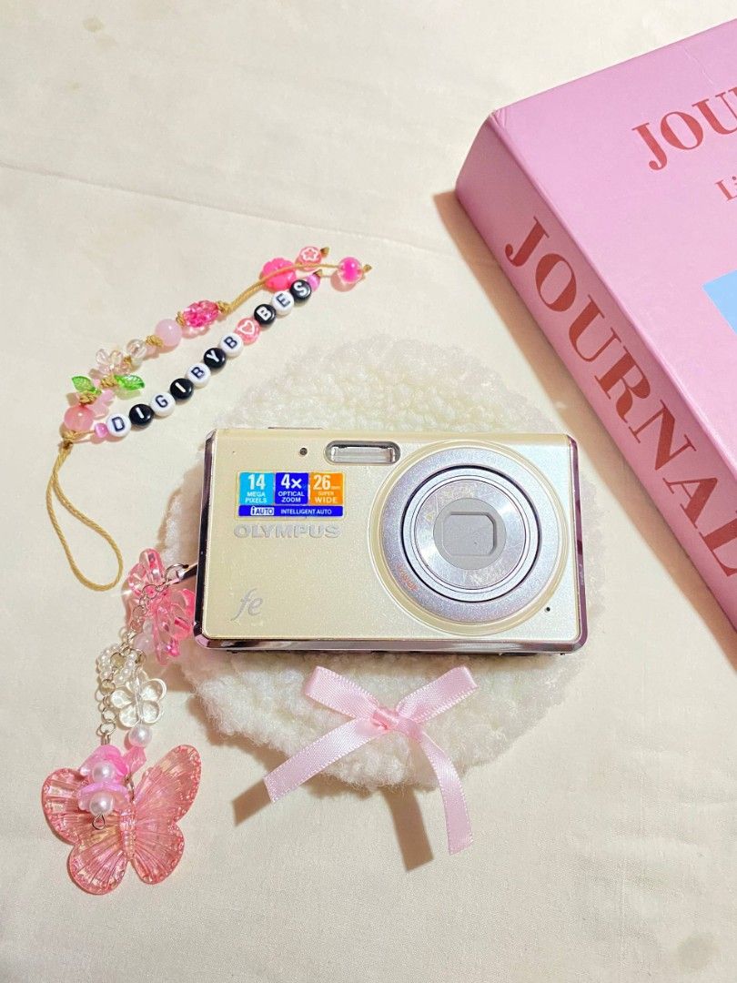 OLYMPUS FE-4020 DIGITAL CAMERA DIGICAM (Category: Construction Tools & Equipment) located in Manila. Submitted by jade_snap (Listing ID 1465385515, Image 1). Description: ✧⁠* OLYMPUS FE-4020 ♡ ₱3,299 READY TO USE mild burn (doesn't affect the output) 🩰Specs: *.' 14 MP *.' 5x optical zoom *.' ISO 80 to 1600 *.' CCD sensor 🎞️ Condition: ७९ all buttons are working, zoom, and flash ७९ body condition: 9/10 ७९ slight hazy 👛 Ready to use! ७९ Inclusio