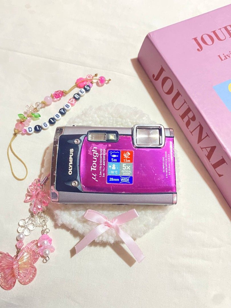 OLYMPUS TOUGH-6020 DIGITAL CAMERA DIGICAM (Category: Cameras) located in Manila. Submitted by jade_snap (Listing ID 1465385442, Image 1). Description: ✧⁠* OLYMPUS TOUGH-6020 ♡ ₱2,799 READY TO USE lcd wrap (doesn't affect the output and functionality) 🩰Specs: *.' 14 MP *.' 5x optical zoom *.' ISO 80 to 1600 *.' CCD sensor *.' waterproof *.' shockproof 🎞️ Condition: ७९ all buttons are working, zoom and flash ७९ body condition: 6/10 ७९ signs of us