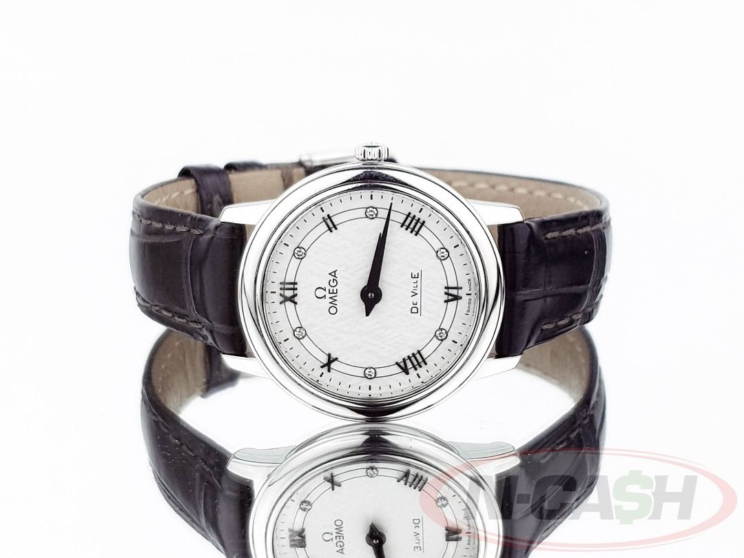 Omega De Ville Prestige (Category: Luxury Watches) located in Quezon City. Submitted by luxury_by_n-cash (Listing ID 1465420337, Image 1). Description: Omega De Ville Prestige Ref. 424.13.27.60.52.002 27mm steel case White dial with diamond markers Black alligator strap Omega 1376 quartz movement Local Omega AD 2022 Watch comes with instruction manual, international warranty card, pictograms card, precious stones certificate card, price and refer