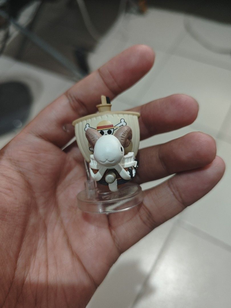 One Pi No Mi Gachapon - Going Merry Ship (Category: Figurines & Statues) located in Rizal. Submitted by absolutejovz (Listing ID 1465424072, Image 1). Description: Authentic, no figure issues. Actual picture posted. 6-7cm height from base to tip. Comes with devil fruit case. .