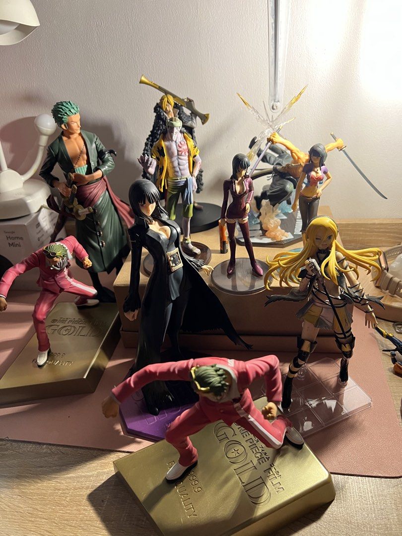 One Piece Roronoa Zoro Battle Version Figure (Category: Figurines & Statues) located in Manila. Submitted by cterrineni76861 (Listing ID 1465476740, Image 1). Description: - Official Roronoa Zoro collectible figure - Dynamic battle pose with sword effects - Detailed sculpt featuring green hair and dark robes - Sturdy branded hexagonal base with smoke effect - Perfect for anime displays - Condition: Loose item, no box included.